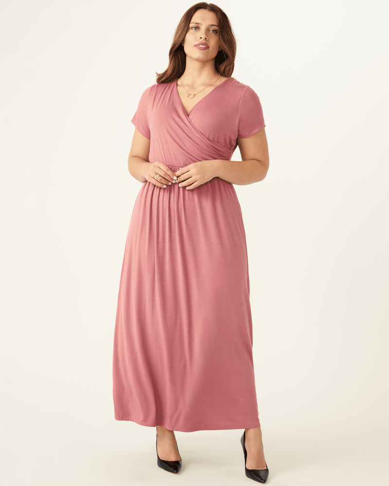 Plus size model with hourglass body shape wearing Carnation Wrap Maxi Dress by Meri Skye | Dia&Co | dia_product_style_image_id:175767